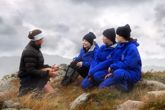 Ms Hodges with Lucy, Natalie and Nicole at the top of Mt Stirling